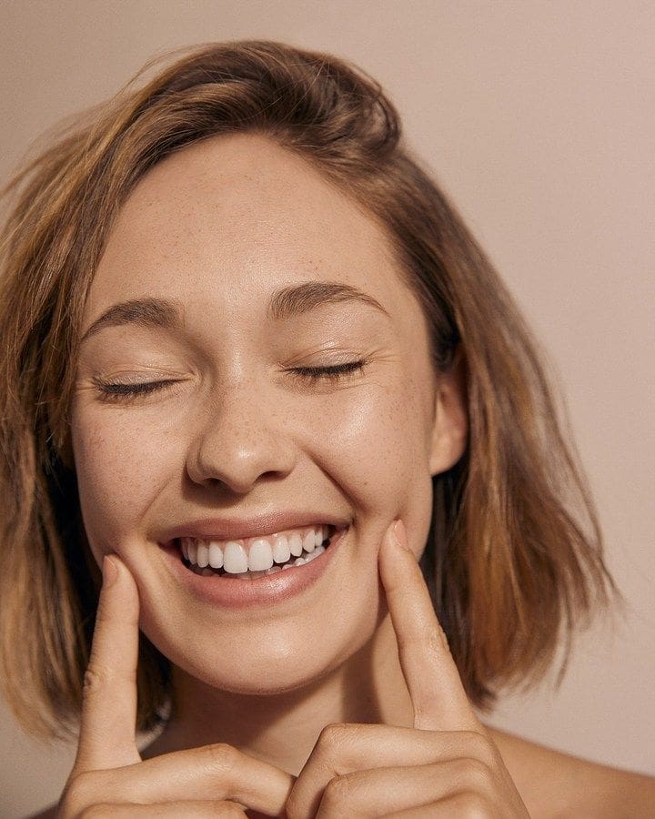 Relaxed, confident smile
